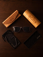 Oahu Ebony sunglasses with bamboo travel case, foldable cork case, microfibre pouch and microfibre cleaning cloth