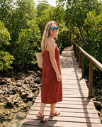 Woman on a mangrove boardwalk in Oahu Ocean sunglasses by Kobe Afrika